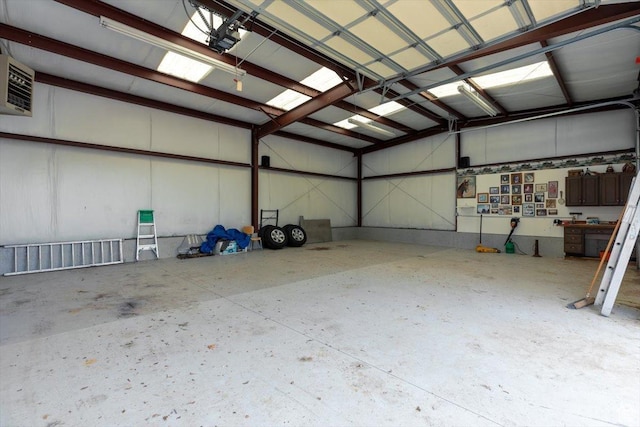 310 E Valley View Dr, Preston, ID 83263 - garage featuring a garage door opener and a heating unit
