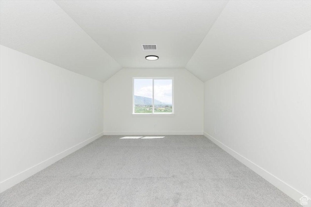 821 E 160 N, Hyde Park, UT 84318 - bonus room featuring carpet, lofted ceiling, and baseboards