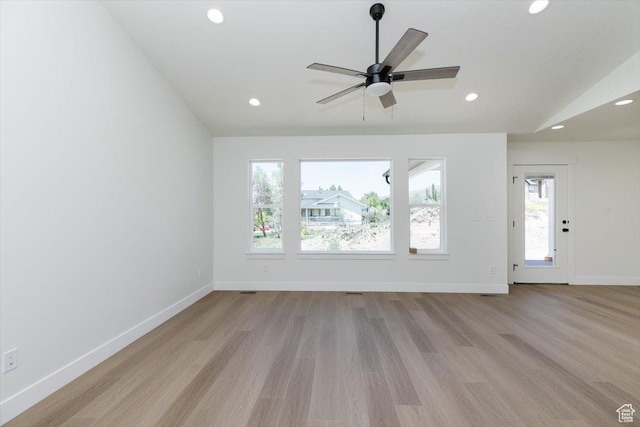 821 E 160 N, Hyde Park, UT 84318 - unfurnished living room with light wood finished floors, recessed lighting, vaulted ceiling, baseboards, and a ceiling fan
