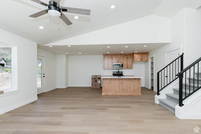 821 E 160 N, Hyde Park, UT 84318 - kitchen with appliances with stainless steel finishes, open floor plan, light countertops, recessed lighting, and light wood-type flooring