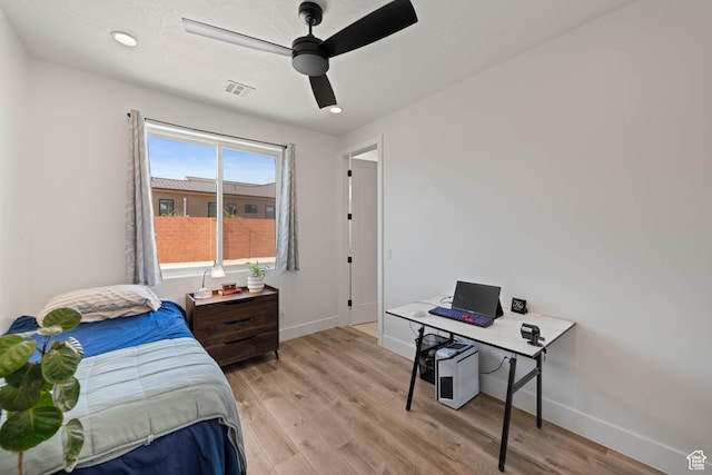 108 N Arrowhead Ln, Ivins, UT 84738 - bedroom with baseboards, light wood-type flooring, and ceiling fan