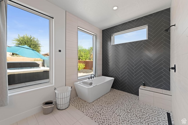 108 N Arrowhead Ln, Ivins, UT 84738 - full bath with a freestanding bath and tile patterned floors