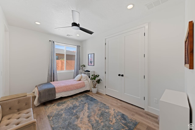 108 N Arrowhead Ln, Ivins, UT 84738 - bedroom with light wood-type flooring, baseboards, recessed lighting, and ceiling fan