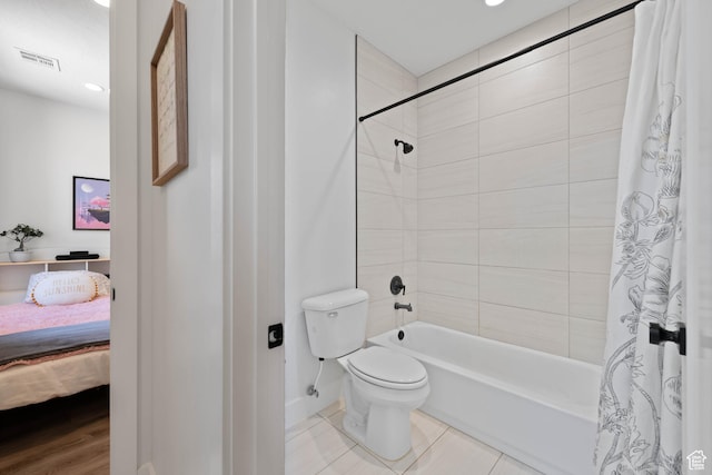 108 N Arrowhead Ln, Ivins, UT 84738 - bathroom with shower / bath combo with shower curtain, toilet, ensuite bath, baseboards, and tile patterned flooring