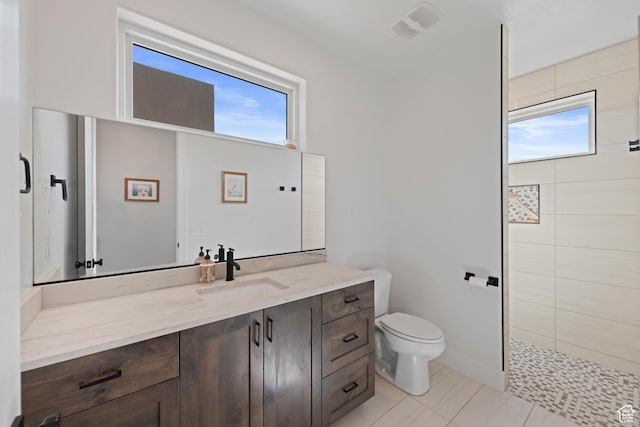 108 N Arrowhead Ln, Ivins, UT 84738 - full bath with tiled shower, vanity, and toilet