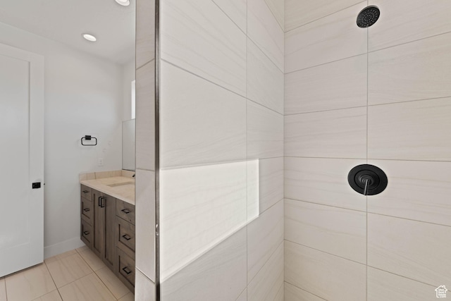 108 N Arrowhead Ln, Ivins, UT 84738 - full bathroom with a tile shower, vanity, baseboards, and tile patterned floors