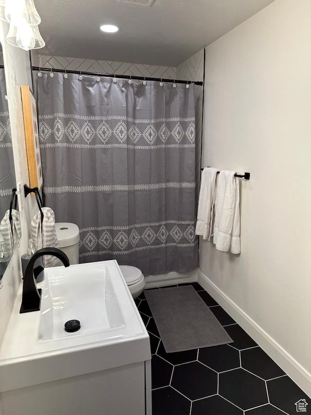 2786 S 3780 W, Hurricane, UT 84737 - bathroom featuring toilet, vanity, tile patterned flooring, recessed lighting, and baseboards