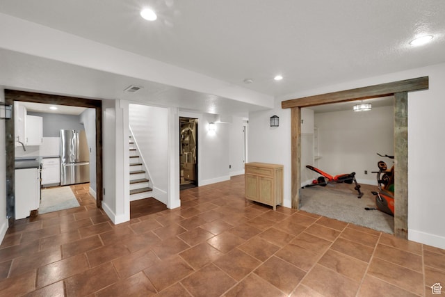 4836 S 5050 W, Hooper, UT 84315 - finished below grade area featuring freestanding refrigerator, recessed lighting, stairs, and baseboards