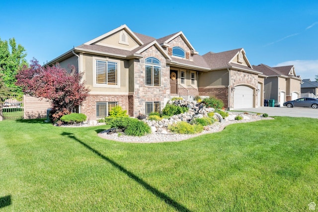 4836 S 5050 W, Hooper, UT 84315 - view of front facade with stone siding, concrete driveway, stucco siding, and a front lawn
