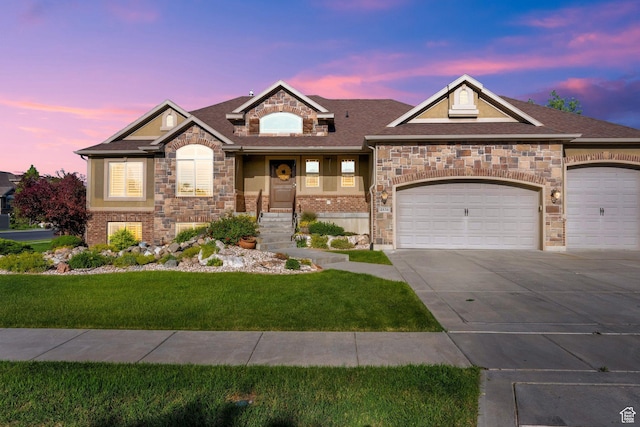 4836 S 5050 W, Hooper, UT 84315 - view of front of home with a lawn, stone siding, driveway, an attached garage, and a shingled roof