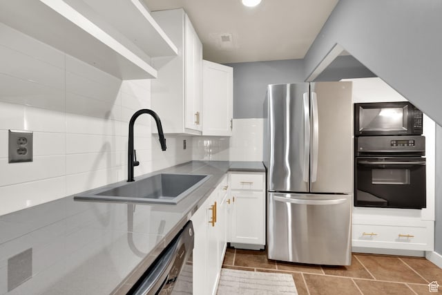 4836 S 5050 W, Hooper, UT 84315 - kitchen with black appliances, a sink, white cabinets, and tasteful backsplash