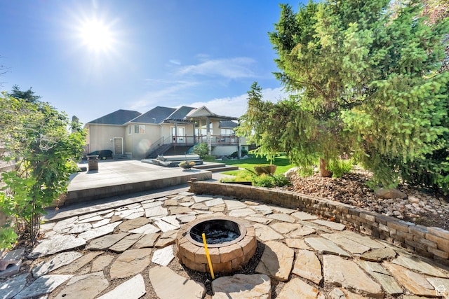 4836 S 5050 W, Hooper, UT 84315 - view of patio / terrace featuring a fire pit and a residential view