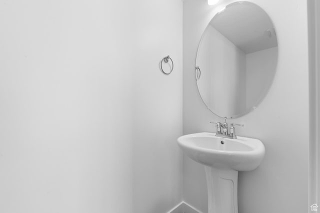 6747 N Tulle Mtn, Eagle Mountain, UT 84005 - bathroom featuring a sink and baseboards