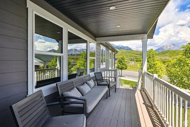 2548 E Ember Dr, Draper Ut Cnty, UT 84020 - porch featuring a mountain view and an outdoor living space