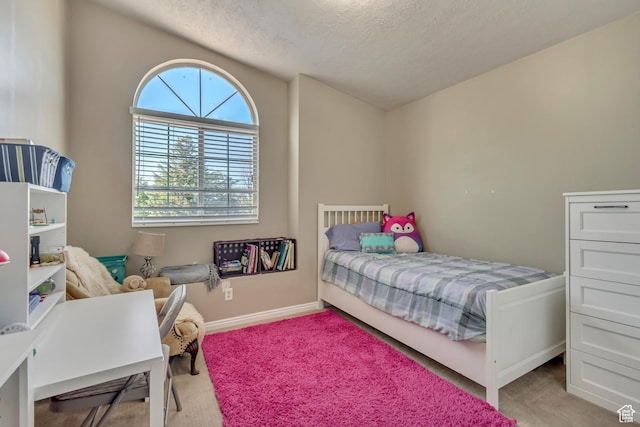 2761 W 9800 S, South Jordan, UT 84095 - carpeted bedroom featuring a textured ceiling and baseboards