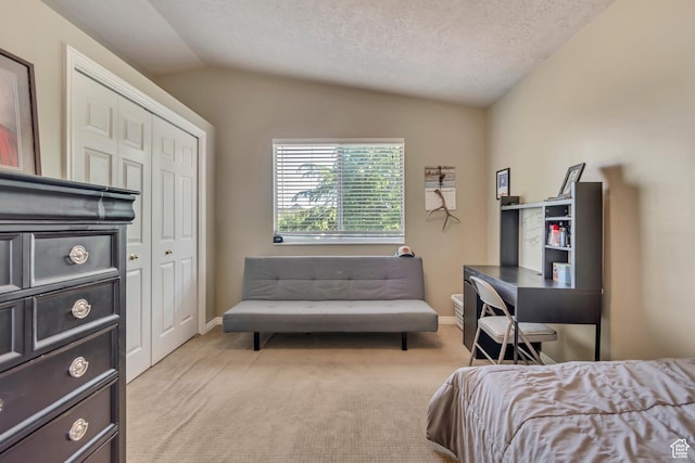 2761 W 9800 S, South Jordan, UT 84095 - bedroom featuring vaulted ceiling, light carpet, a closet, baseboards, and a textured ceiling