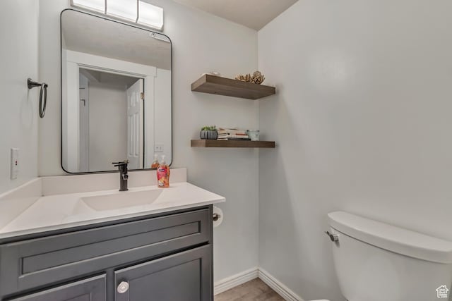 2761 W 9800 S, South Jordan, UT 84095 - half bath featuring toilet, vanity, and baseboards