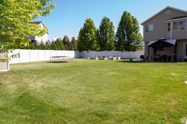 2182 W 1145 N, Clinton, UT 84015 - view of yard featuring a trampoline