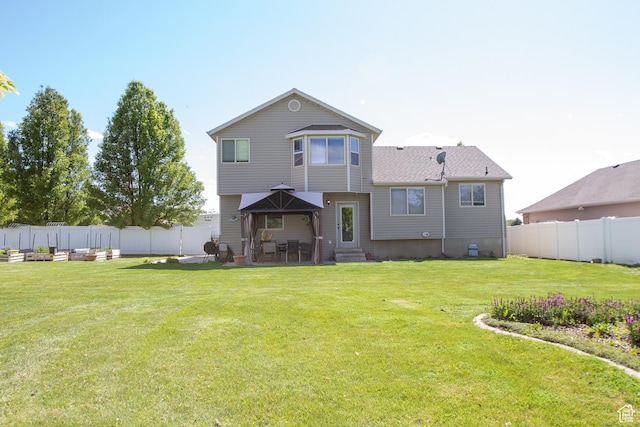 2182 W 1145 N, Clinton, UT 84015 - back of house featuring entry steps and a patio
