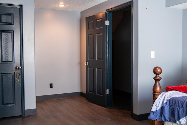 2182 W 1145 N, Clinton, UT 84015 - bedroom featuring dark wood-style floors, baseboards, and a textured ceiling