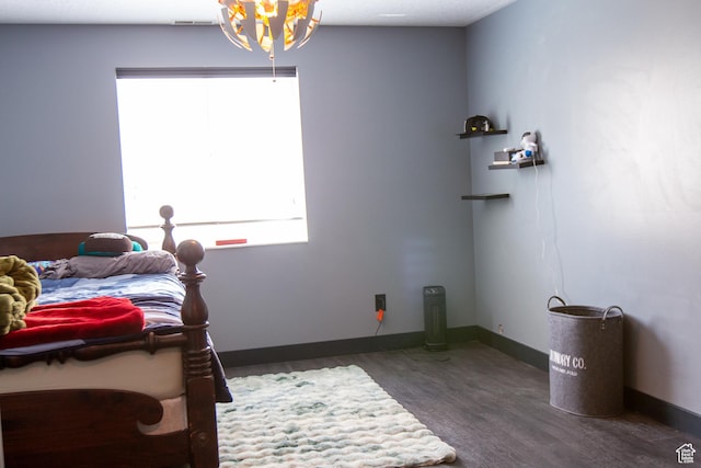2182 W 1145 N, Clinton, UT 84015 - bedroom featuring multiple windows, wood finished floors, and baseboards