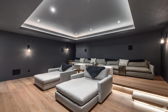 7744 E Moon Dance Cir, Kamas, UT 84036 - cinema with a raised ceiling, light wood-style flooring, and recessed lighting