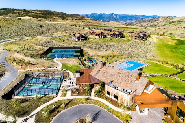 7744 E Moon Dance Cir, Kamas, UT 84036 - aerial view of a pool area and a mountain backdrop