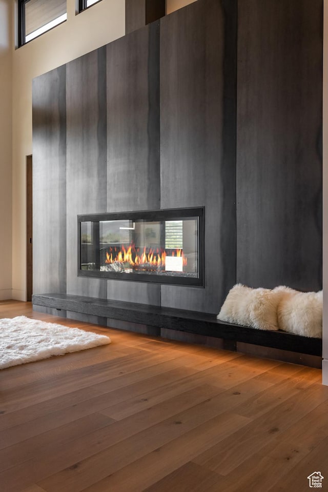 7744 E Moon Dance Cir, Kamas, UT 84036 - detailed view of a multi sided fireplace and wood finished floors