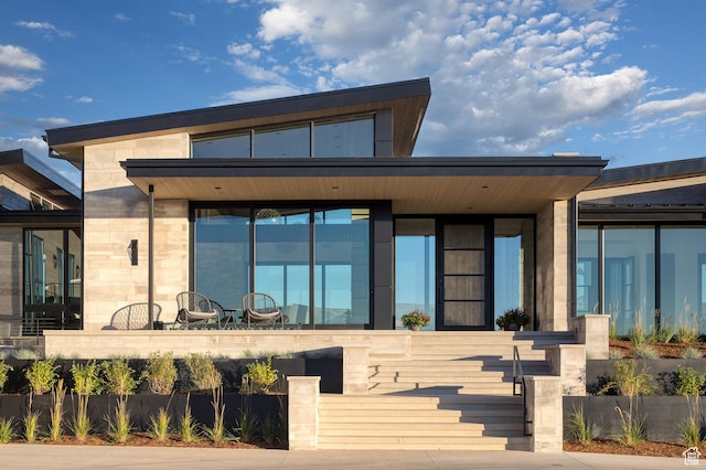 7744 E Moon Dance Cir, Kamas, UT 84036 - rear view of property featuring stone siding