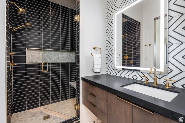 7744 E Moon Dance Cir, Kamas, UT 84036 - bathroom featuring a stall shower, vanity, and backsplash