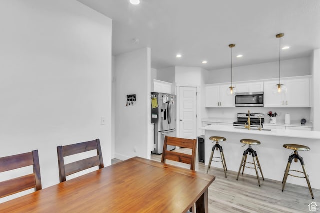 1994 N 3900 W Unit 217, Lehi, UT 84043 - dining area featuring recessed lighting and light wood finished floors