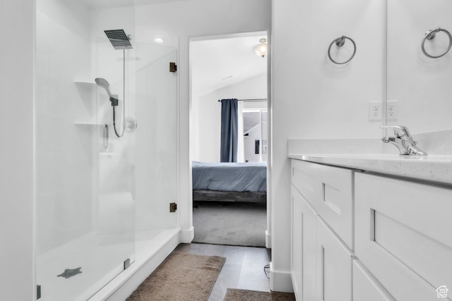 1994 N 3900 W Unit 217, Lehi, UT 84043 - ensuite bathroom with a stall shower, vanity, and vaulted ceiling