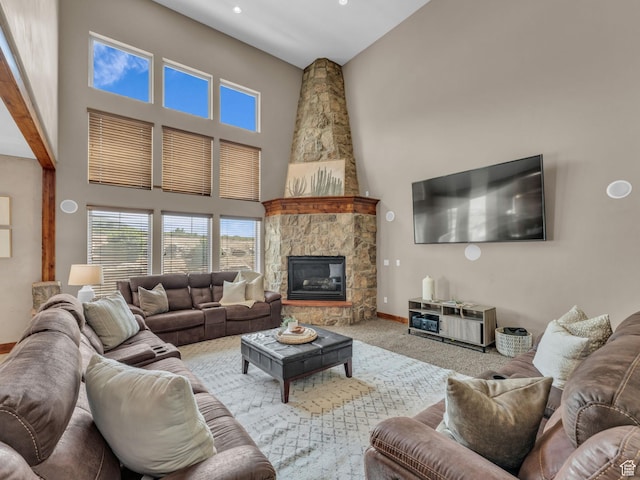 2894 E Cobblemoor Ln, Sandy, UT 84093 - carpeted living room featuring a towering ceiling, baseboards, a fireplace, and recessed lighting