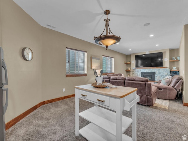 2894 E Cobblemoor Ln, Sandy, UT 84093 - living room with light colored carpet, baseboards, a fireplace, and recessed lighting