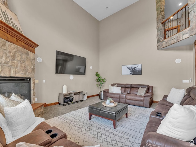 2894 E Cobblemoor Ln, Sandy, UT 84093 - carpeted living room with a high ceiling, baseboards, and a fireplace