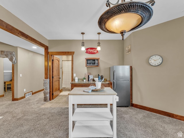 2894 E Cobblemoor Ln, Sandy, UT 84093 - kitchen featuring appliances with stainless steel finishes, light colored carpet, and baseboards