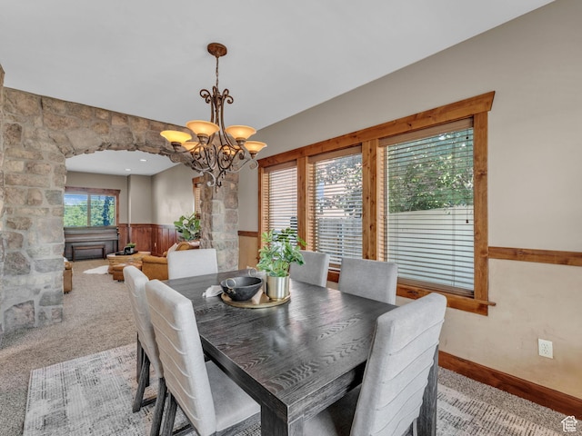 2894 E Cobblemoor Ln, Sandy, UT 84093 - dining area featuring wainscoting, a chandelier, and carpet floors
