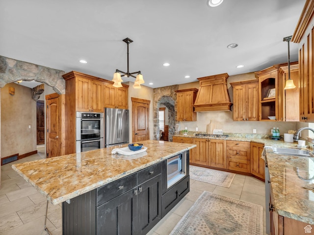 2894 E Cobblemoor Ln, Sandy, UT 84093 - kitchen featuring stainless steel appliances, custom range hood, a sink, a center island, and open shelves