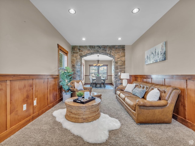 2894 E Cobblemoor Ln, Sandy, UT 84093 - living area featuring arched walkways, carpet floors, a wainscoted wall, recessed lighting, and a chandelier