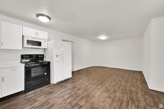 10679 S 2200 W, South Jordan, UT 84095 - kitchen with white appliances, dark wood finished floors, white cabinets, a textured ceiling, and baseboards