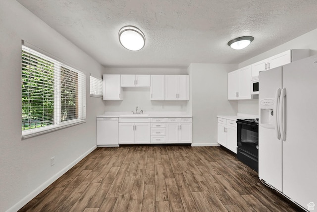 10679 S 2200 W, South Jordan, UT 84095 - kitchen with white appliances, a sink, light countertops, white cabinets, and a textured ceiling