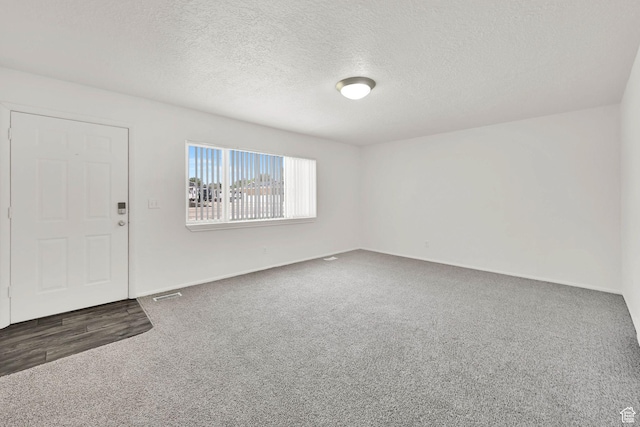 10679 S 2200 W, South Jordan, UT 84095 - carpeted entryway with a textured ceiling and baseboards