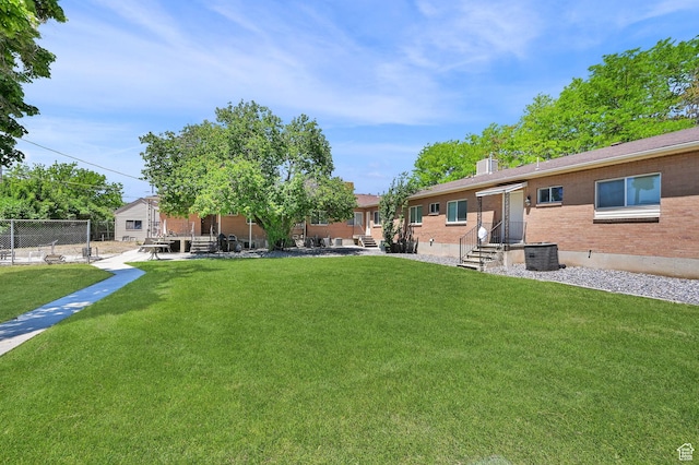 10679 S 2200 W, South Jordan, UT 84095 - view of yard with central AC unit and entry steps