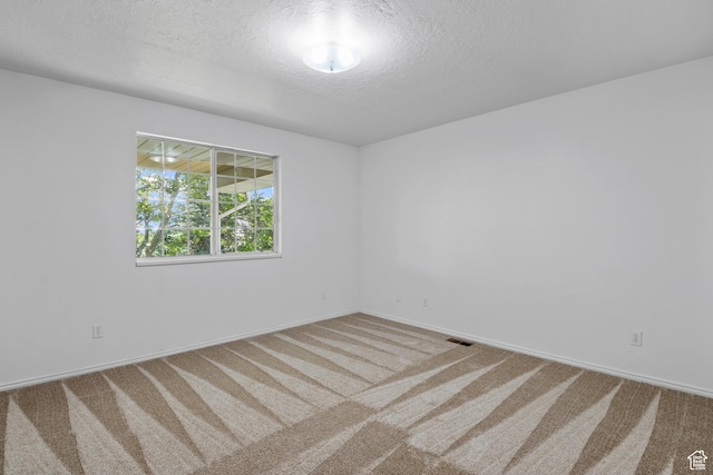 58 S 900 E, Spanish Fork, UT 84660 - spare room with carpet flooring, a textured ceiling, and baseboards