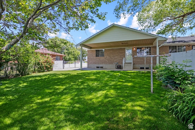 58 S 900 E, Spanish Fork, UT 84660 - rear view of property with brick siding and cooling unit