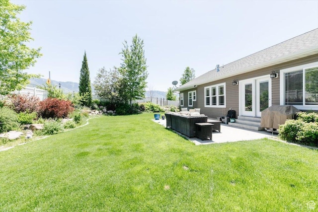 225 E 620 S, Smithfield, UT 84335 - view of grassy yard with outdoor lounge area, a patio area, entry steps, and a mountain view