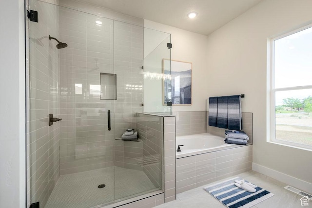 1104 N Windflower Ln Unit 127, Grantsville, UT 84029 - full bath featuring a stall shower, a bath, tile patterned flooring, baseboards, and recessed lighting