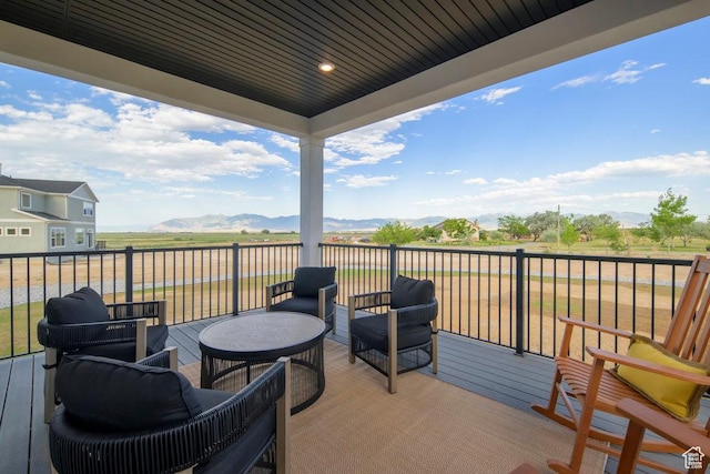 1104 N Windflower Ln Unit 127, Grantsville, UT 84029 - wooden terrace with a mountain view