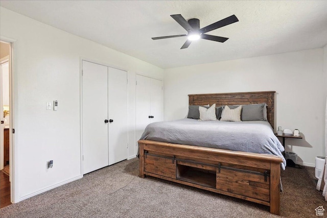 587 W 1460 N, Clinton, UT 84015 - carpeted bedroom featuring two closets, a ceiling fan, and baseboards