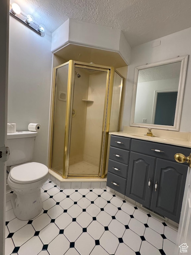 4440 W 6095 S, Taylorsville, UT 84118 - full bathroom with vanity, a shower stall, tile patterned floors, toilet, and a textured ceiling